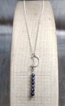 Load image into Gallery viewer, Sterling Silver Necklace with Crescent Moon and Genuine Natural Sapphire Gemstones- Hanging In Overnight LEO- LEOW